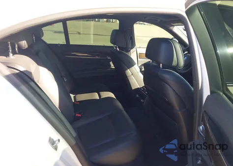 2015 BMW 740I из США, поврежденный, VIN WBAYA6C59FGK16663